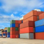 depositphotos_42804925-stock-photo-forklift-handling-containers-box