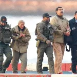 imagen-nicolas-maduro-y-su-mujer-cilia-flores-detenidos-por-agentes-de-eeuu-a-su-llegada-al-pais-c9cfc6c7-focus-0-0-896-504.jpg