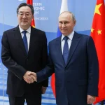 vladimir-putin-y-ding-xuexiang-foto-tass.jpg